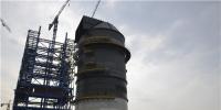 錫林郭勒熱電項(xiàng)目部脫硫收塔頂升制作到頂